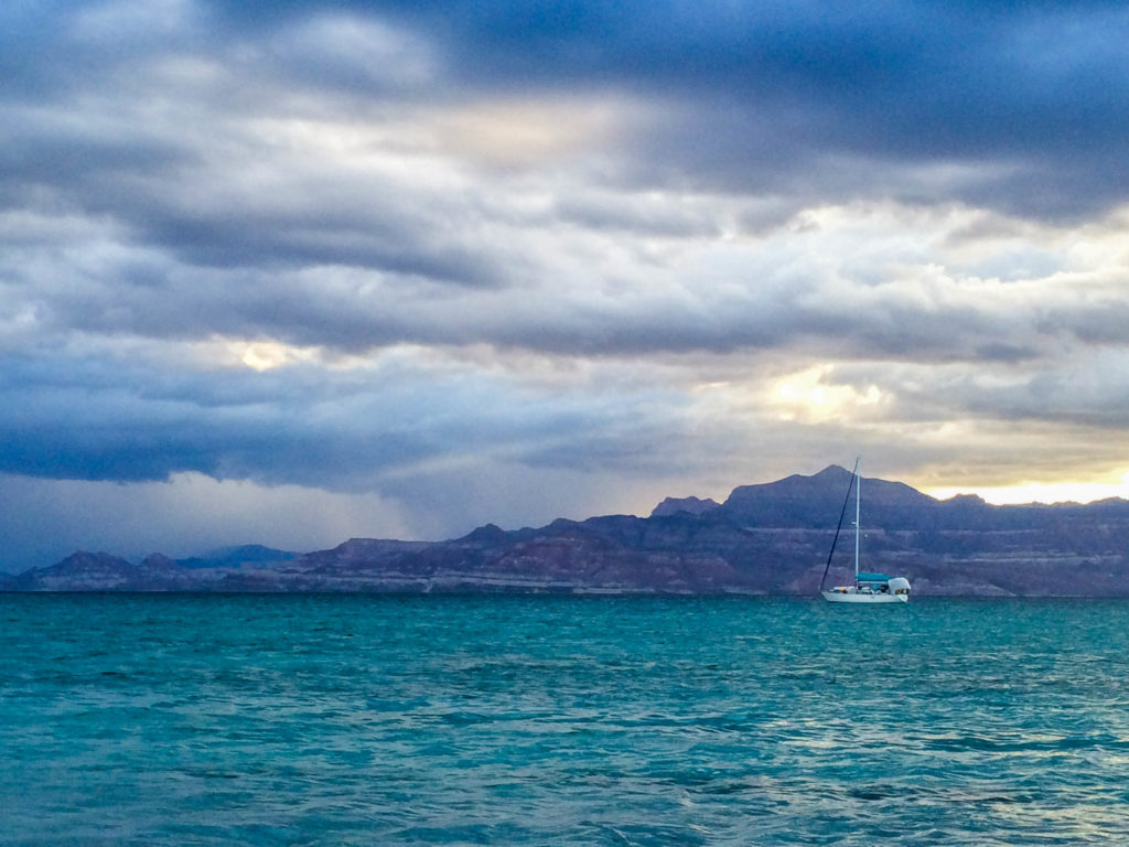 Oleada anchored in front of the rugged Sierra de la Giganta range in the southern Sea of Cortez.