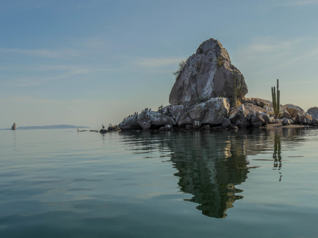 Roca Piramide, close to our second anchorage, with tall Roca Solitaria towering in the background on the left.