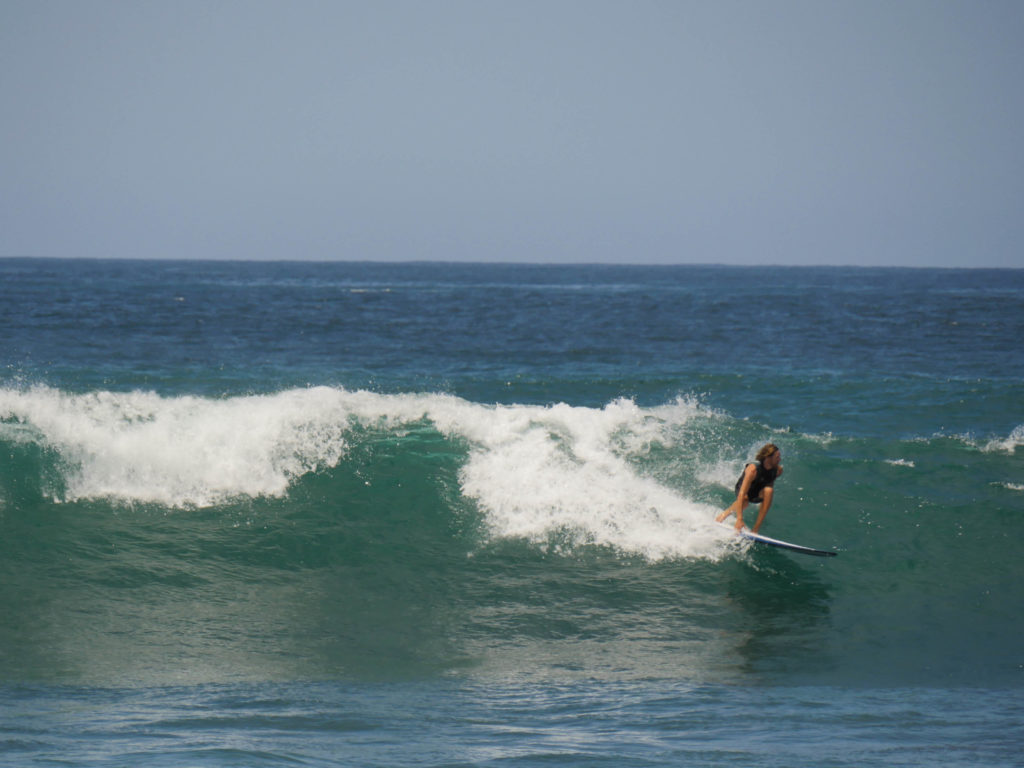 Josh catching a ride at a break in Baja.