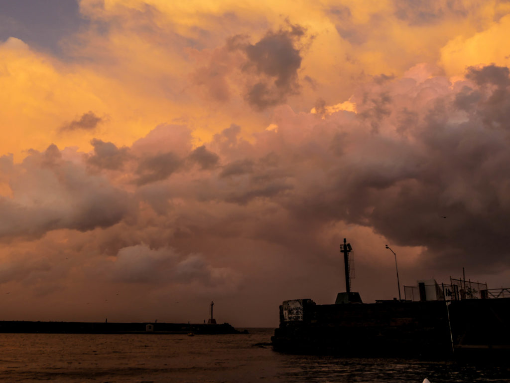 In the middle of the Baja California peninsula, the entrance to the Santa Rosalía harbor protects boats from an impending storm.