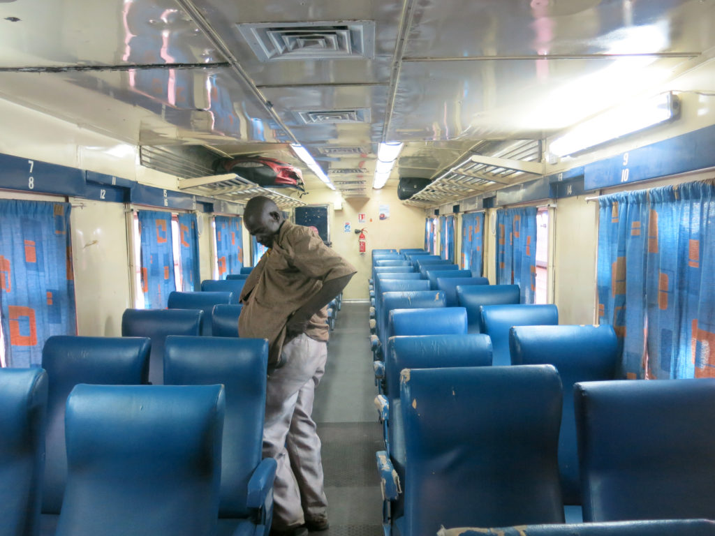 A porter in the first-class car.