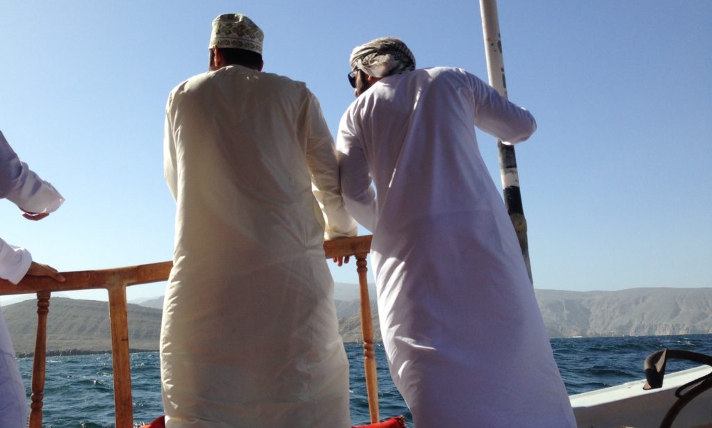 My Omani companions aboard our wooden boat just off the coast from Khasab