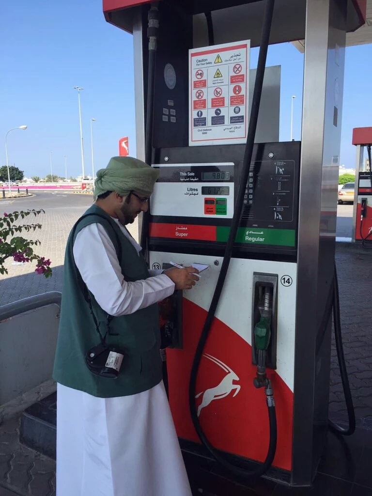 A representative from the Public Authority for Consumer Protection inspects a fuel pump on January 15th. Photo courtesy of Oman News Network.