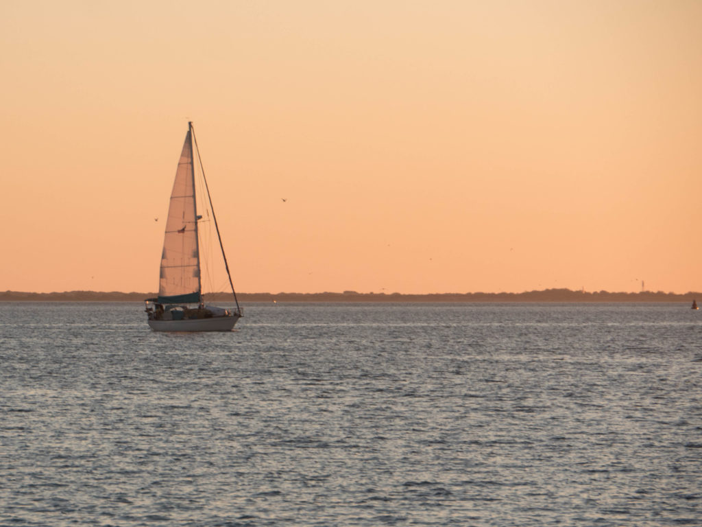 Oleada navigates the channel into Topolobampo with a little bit of evening wind in the mainsail.