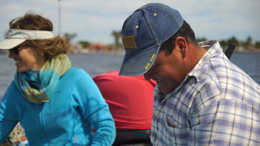 Talking and fishing. Photo from video by Jon Neely.