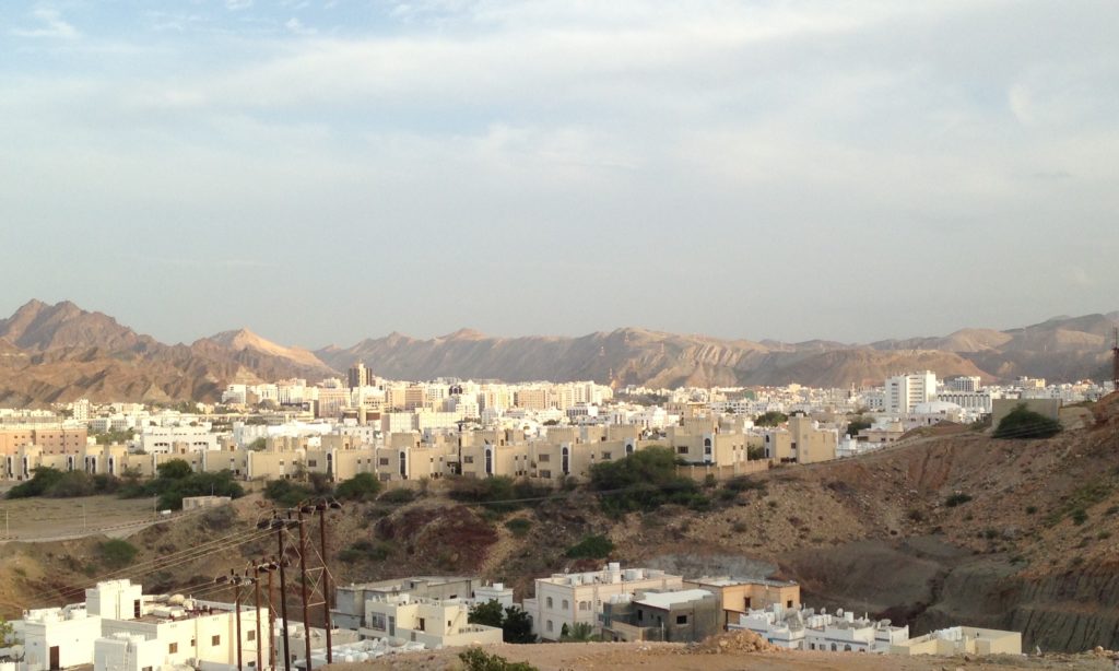One of Muscat’s original “downtowns,” the Ruwi neighborhood. One of the tallest structures in Oman, the telecommunications tower, is just barely visible above the power lines