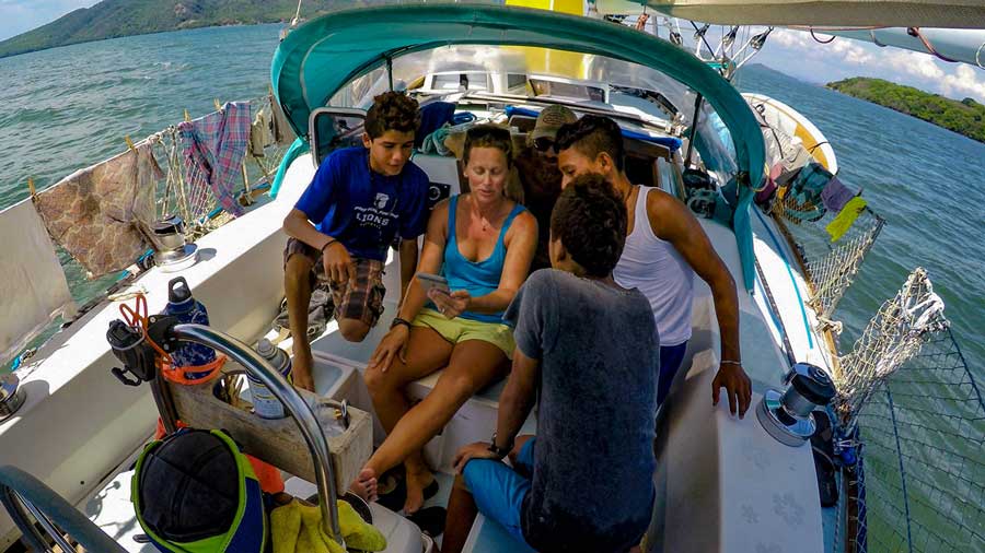 Going through photos from Mexico with Tony, Nando, and their friend Alex. Photo by SV Prism. 