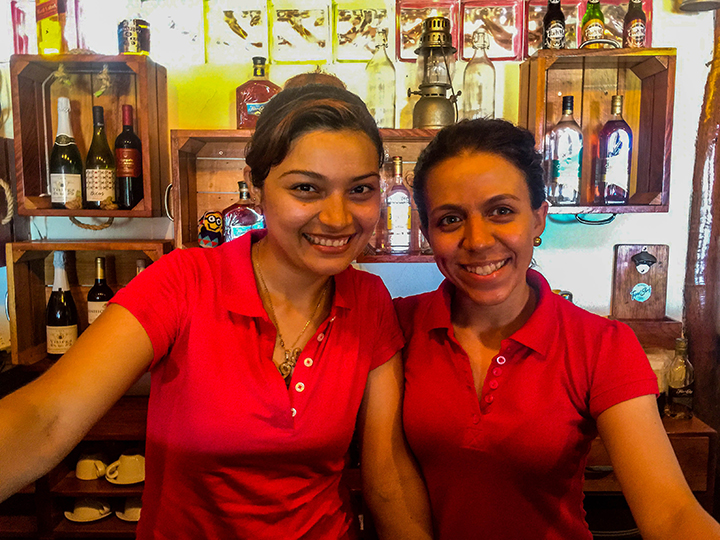 Lisseth and Lalesca, two local young women who now work in tourism at the tapas bar. Lalesca is studying to be a nurse.