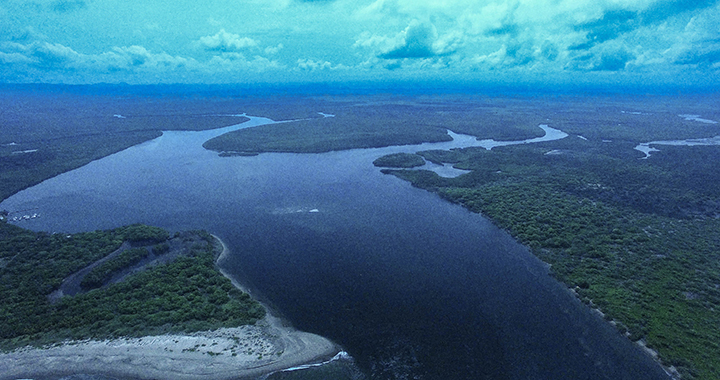 The beautiful Aserradores estuary. The marina is on the far left, and the breaking wave in the center marks a reef. 