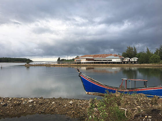 Dark clouds crowd the horizon in Banda Aceh, where nothing is as simple as it seems.) 