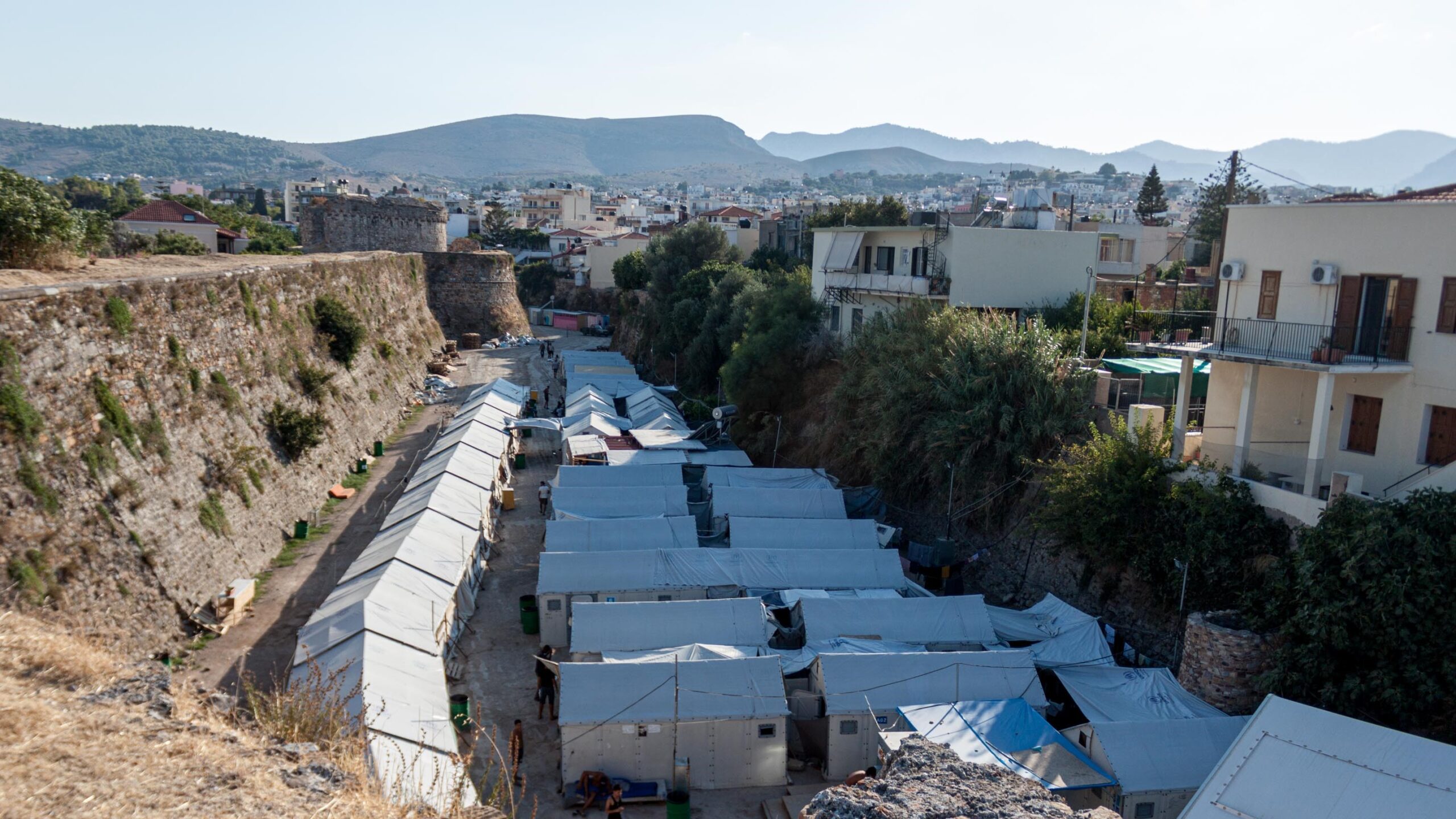 On a Greek island, humanitarian groups' funding dries up